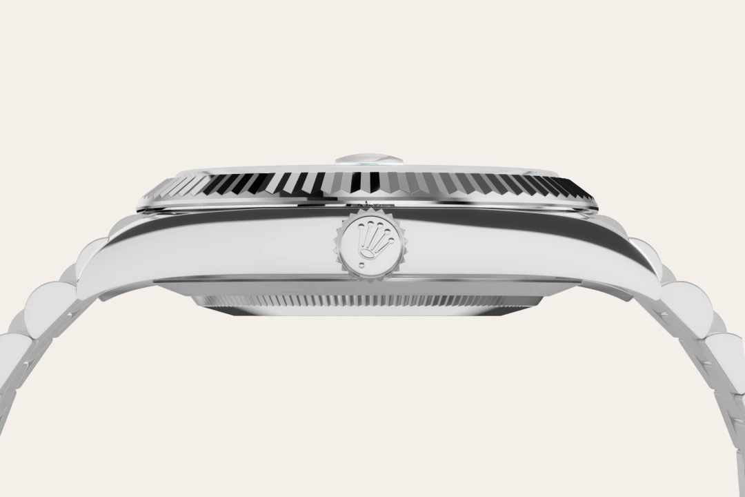 Rolex Day-Date 40 in platinum with an ice blue dial, fluted bezel, and President bracelet, m228236-0018 - Goldfinger Rolex Day-Date 40 in platinum with an ice blue dial, fluted bezel, and President bracelet, m228236-0018 - Goldfinger