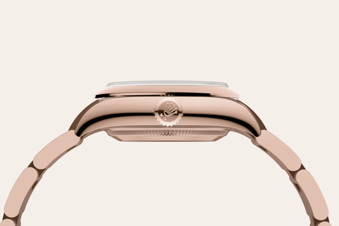 Rolex Oyster Perpetual 28 in Everose gold with a Black dial, domed  bezel, and Oyster bracelet, m276205-0001 - Goldfinger