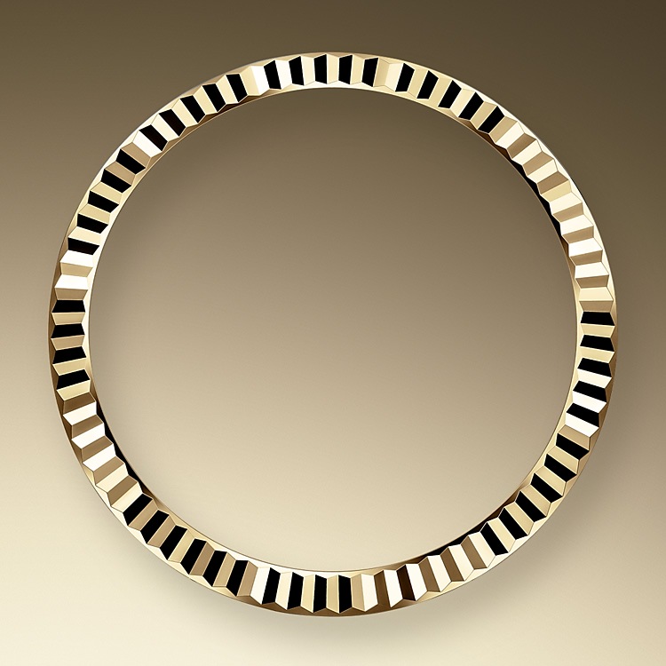 the fluted bezel oystersteel and yellow gold 