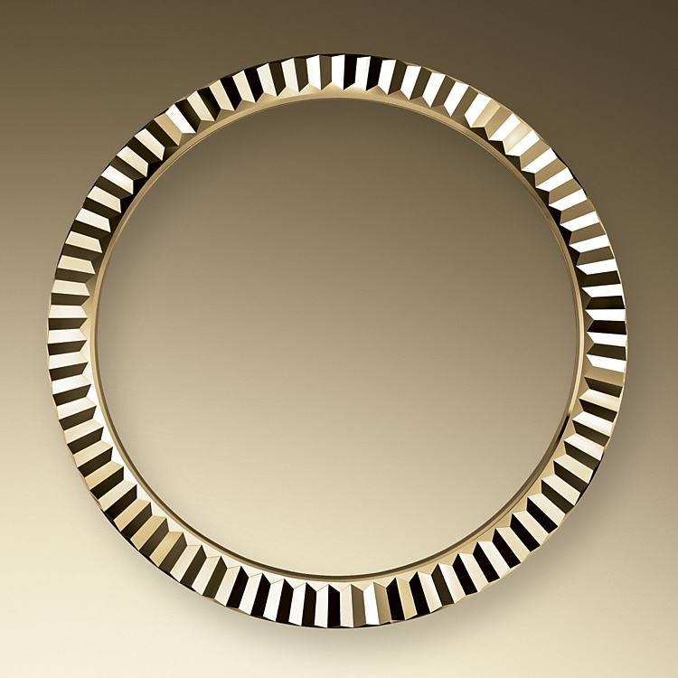 the fluted bezel oystersteel and yellow gold